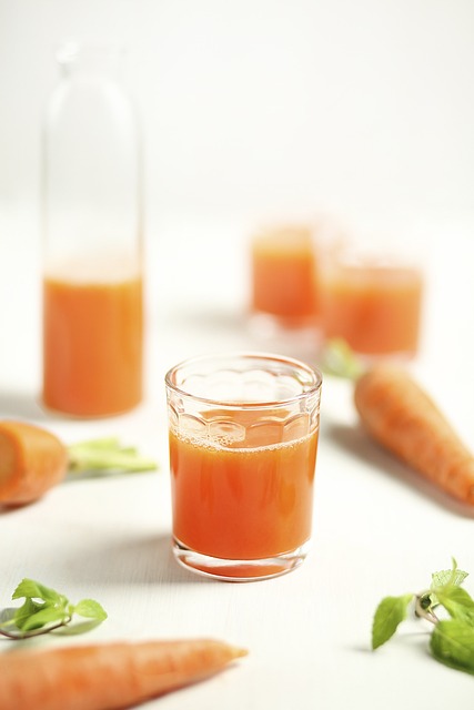 A glass filled with carrot juice