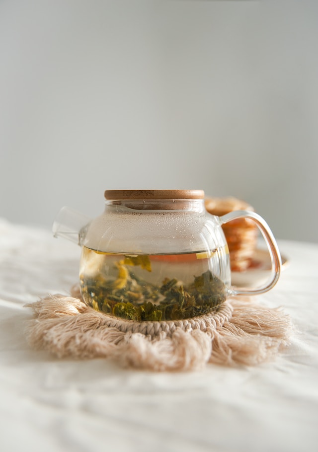 Herbs seeping in a teapot